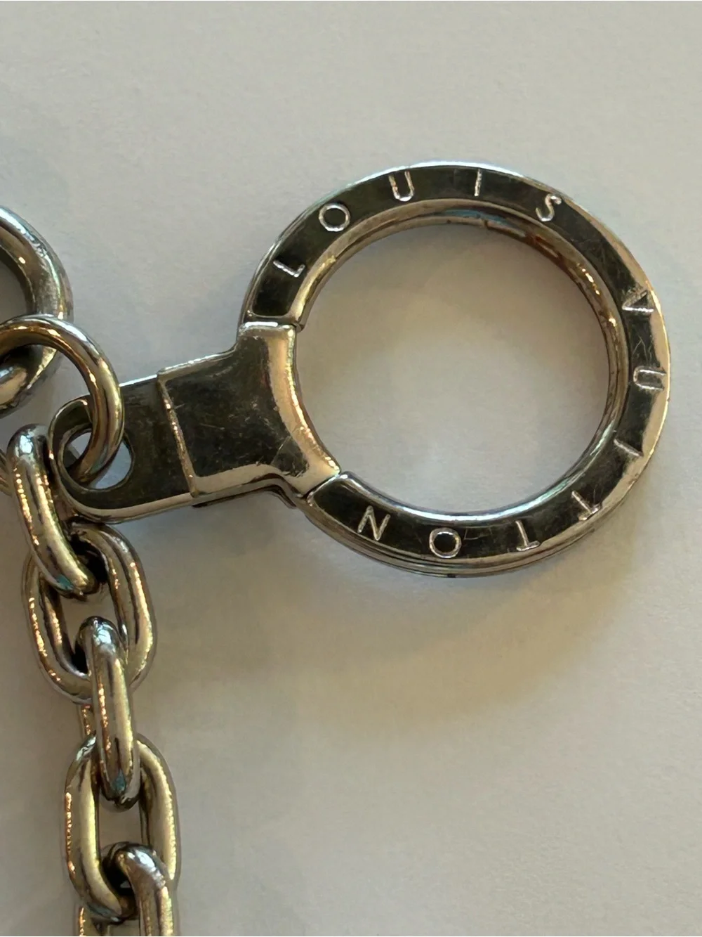 Louis Vuitton Silver Metal LV Logo Keyring Charm
